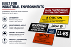 Industrial warning signs with text and icons on a white background