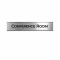 Brushed silver wall holder sign indicating entrance to conference room