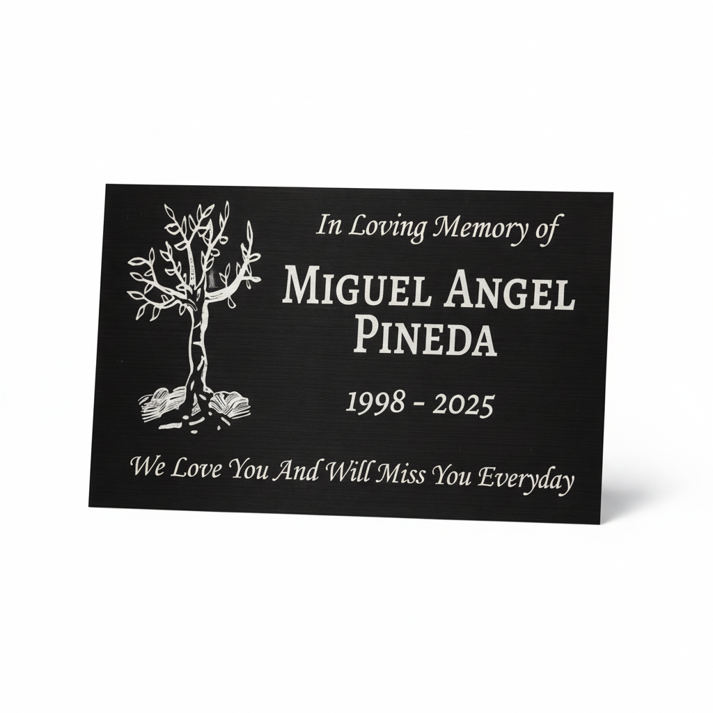 Memorial plaque with tree design and text for Miguel Angel Pineda on a white background