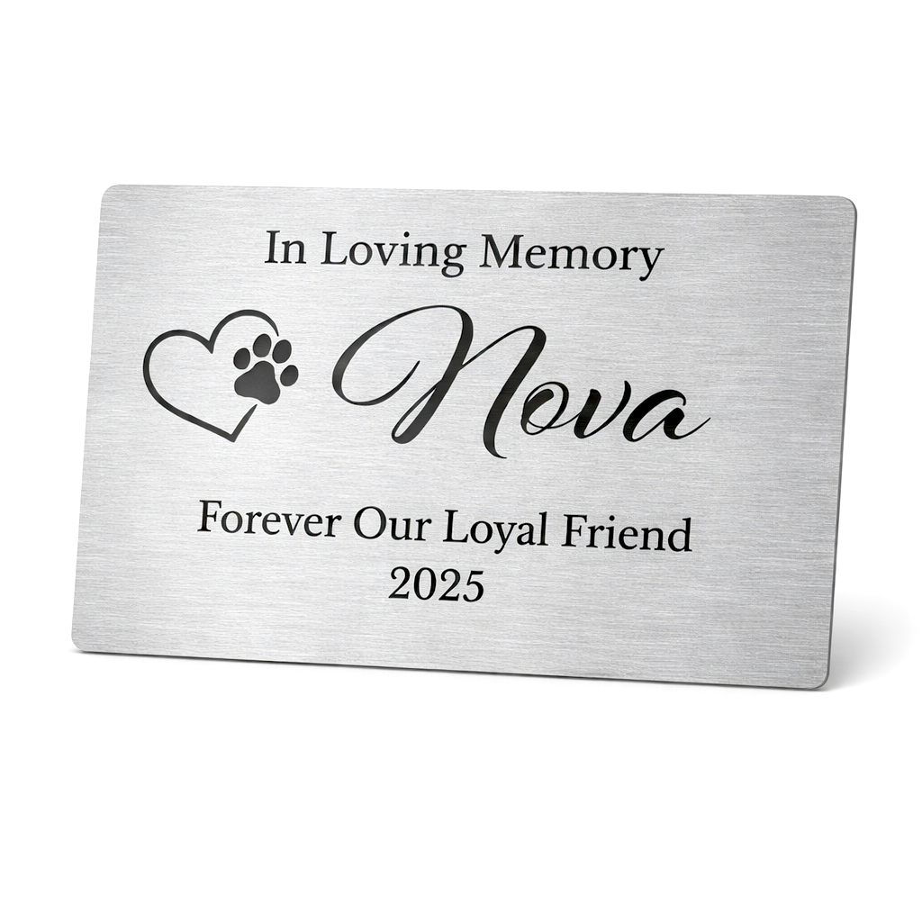 Memorial plaque for a pet named Nova with a heart and paw print design on a white background.