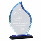 Glass award with blue accents on a white background