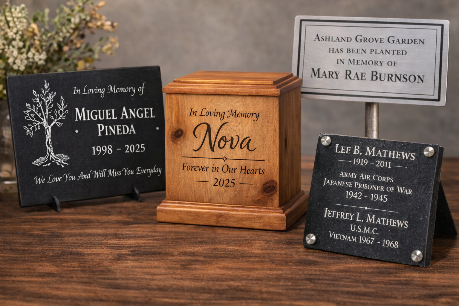 Memorial urn and plaques on a wooden surface with a blurred background