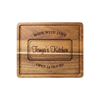 Wooden cutting board with engraved text on a white background